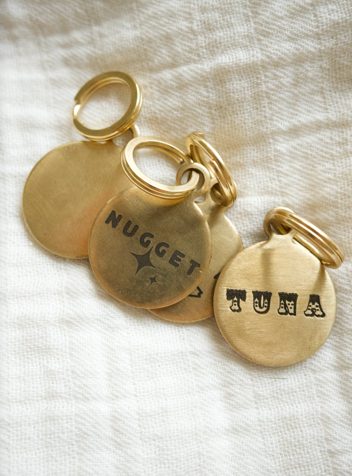100% brass dog tags